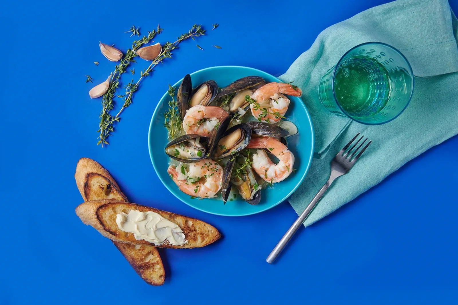 recipe image Shrimp & Mussels in Wine Sauce with Garlic Crostini