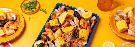 recipe image grilled-clambake-in-foil-packets