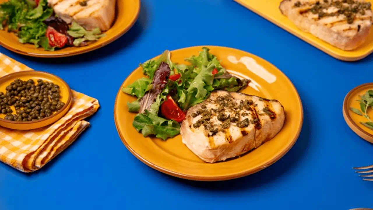 recipe image grilled-swordfish-in-herb-sauce-with-couscous-salad