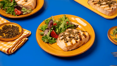 recipe image grilled-swordfish-in-herb-sauce-with-couscous-salad